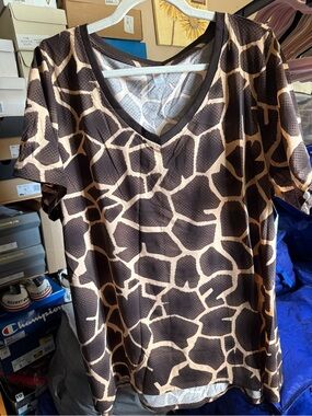 LuLaRoe Brown and Cream Giraffe-Print V-Neck Tee